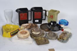 A good collection of advertising pub ashtray and jugs along with other breweriana