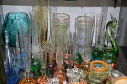 A good collection of studio glass to include many bubble stem vases and a large studio vase
