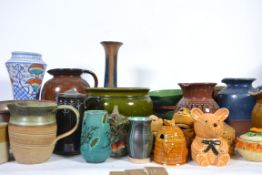 A large collection of studio pottery to include Bretby , honey pots etc.