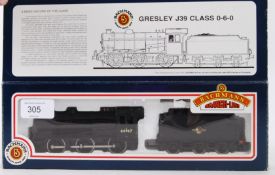BACHMANN: An original Bachmann 00 gauge 31-852 railway trainset 64967 locomotive and tender.