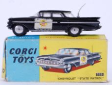 CORGI: An original vintage Corgi diecast model 223 Chevrolet State Patrol car diecast model,