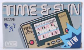TIME & FUN: A rare Nintendo ' Game & Watch ' style Time & Fun handheld games console, made by VTech.