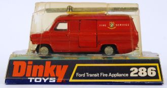 DINKY: An original vintage Dinky Toys diecast model No. 286 Ford Transit Fire Appliance.