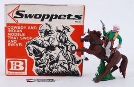 SWOPPETS: An original vintage Britains / Herald Swoppets Cowboys & Indians 633 ' Cowboy Firing Twin