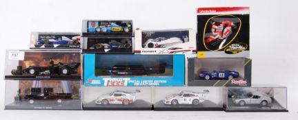 DIECAST: A collection of assorted boxed diecast model cars to include 2x Eaglemoss Batman