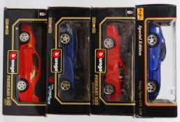 BURAGO: A collection of 4x Burago 1:18 scale diecast model cars - 2x Dodge Vipers, and 2x Ferraris.