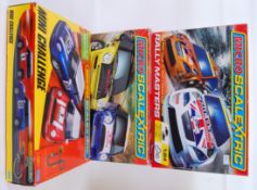 SCALEXTRIC: A collection of 3x boxed Micro Scalextric racing sets - Mini Challenge,