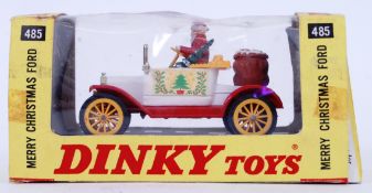 DINKY: A original vintage Dinky diecast model 485 Merry Christmas Ford. Within the original box.