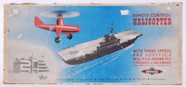 HELICOPTER: A vintage Nulli Secundus ' British Made ' tinplate ' Remote Control Helicopter ' toy