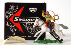 SWOPPETS: An original vintage Britains / Herald Swoppets Cowboys & Indians 632 ' Cowboy Throwing