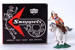 SWOPPETS: An original vintage Britains / Herald Swoppets Cowboys & Indians figure. Mounted.