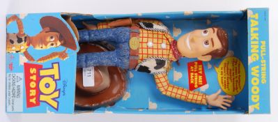TOY STORY: An original issue 1995 Toy Story Pixar ' Talking Woody ' doll figure.
