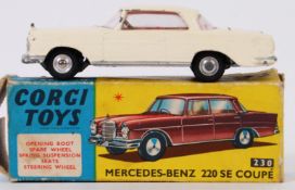 CORGI: An original vintage Corgi Toys diecast model No. 230 Mercedes Benz 220 SE Coupe.