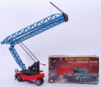 TOYS: A vintage battery operated Asahi made RC Leopard Tank, within the original box,