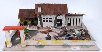 FARM: A pre-war likely Britains wooden toy farm, with a selection of lead figures,