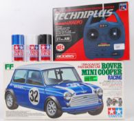 TAMIYA: A Tamiya 1:10 scale Rover Mini Cooper radio controlled car.