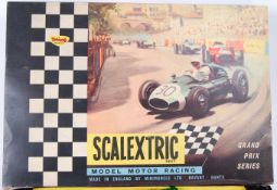 SCALEXTRIC: A vintage boxed Scalextric GP33 racing set.
