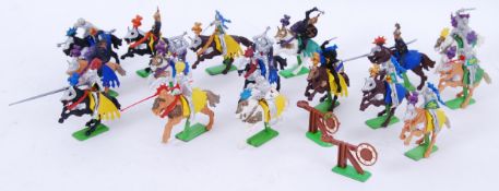 BRITAINS: A collection of Britains Deetail mounted Knight figures on horseback, some with weapons.