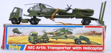 DINKY: An original vintage Dinky diecast military model 618 AEC Artic Transporter With Helicopter.