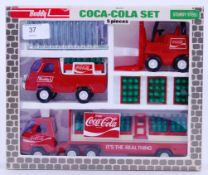 BUDDY L: An original tinplate Buddy L Coca Cola model car advertising set.