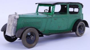 TRIANG TINPLATE: An original vintage pre-war tinplate model clockwork Triang Toys saloon car.