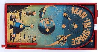 MAN IN SPACE: A rare Dan Dare style 1950's Chad Valley made ' Man In Space ' bagatelle playing