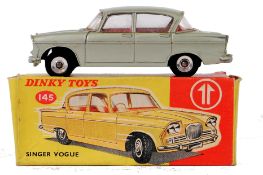 DINKY: An original vintage Dinky 145 diecast model Singer Vogue. Within the original box.