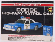 DODGE HIGHWAY PATROL: An original vintage 1980's Taiyo Radio Racer RC car ' Dodge Highway Patrol '.
