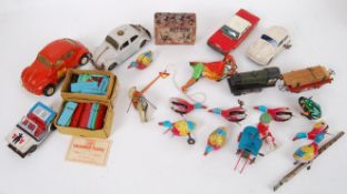 TINPLATE: A collection of vintage tinplate items to include vehicles and novelty toys to include a