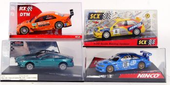 SCALEXTRIC: A collection of 4x Scalextric style slot racing 1:32 scale cars,