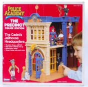 POLICE ACADEMY; A vintage Kenner made ' Police Academy - The Precinct '. Police Station HQ playset.