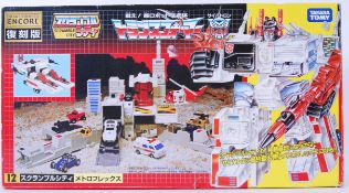 TRANSFORMERS: A rare Japanese import Takara Tomy ' Scramble City ' Transformers reissue toy.