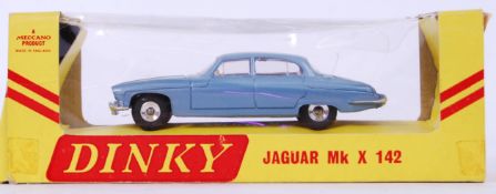 DINKY: An original vintage Dinky 142 diecast model Jaguar Mark X ( 10 )..