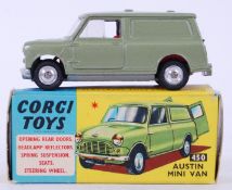 CORGI: A rare Corgi diecast model Austin Mini Van No. 450. Dark green body. Mint+ condition.