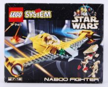 LEGO: An original Lego System Star Wars boxed set 7141 Naboo Fighter.