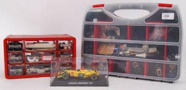 SCALEXTRIC: A quantity of assorted vintage Scalextric spares (x2 cases) along with a Scalextric