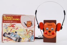 MONKEY RADIO: A fabulous vintage retro ' Monkey Walkie Radio ' walkman. ' Elegance! Novelty! '.