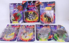 ALIENS: A collection of 7x original Kenner made ' Aliens ' & ' Predator ' carded action figures.