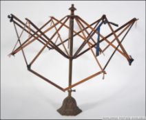 A 19th century brass and cast iron metam