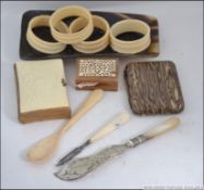 A collection of bone and tortoiseshell i