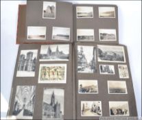 An early 20th century postcard album to