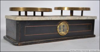 An Edwardian mahogany inlaid brass pair