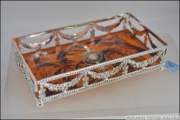 A silver plated plique a jour style gall