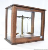 A set of 20th Century glazed teak cased