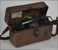 A vintage mid century leather cased engi