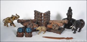 A mixed lot to include carved canon wood