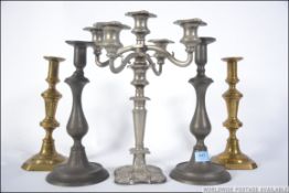 2 19th century large pewter pusher candl