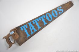 An upcycled vintage wood working saw, wi