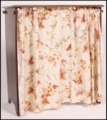 An Edwardian oak shoe stand, having meta