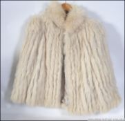 A good example of a blue fox fur short j